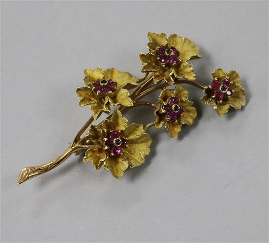 An Italian 18ct gold and ruby set floral spray brooch, in a Bulgari box, 57mm.